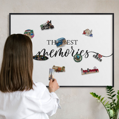 Vacation magnet board with a black frame Inspiring memories