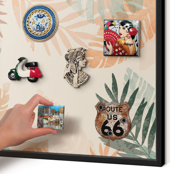 Vacation magnet board with a black frame Tropical leaves