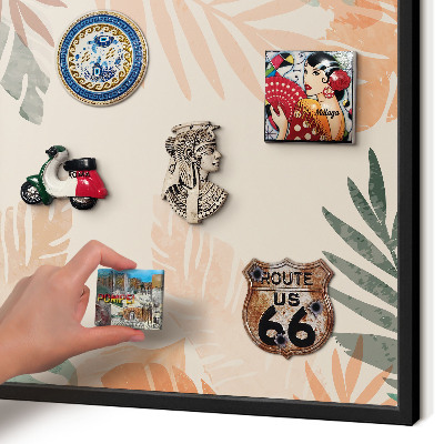 Vacation magnet board with a black frame Tropical leaves