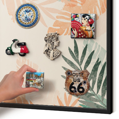 Vacation magnet board with a black frame Tropical leaves
