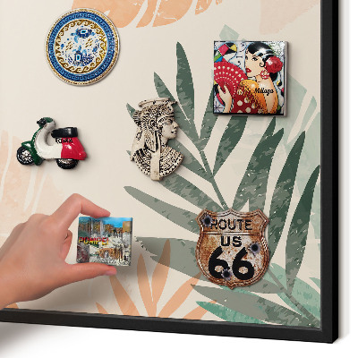 Vacation magnet board with a black frame Tropical leaves