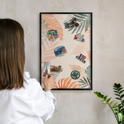 Vacation magnet board with a black frame Tropical leaves