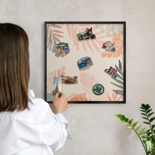 Vacation magnet board with a black frame Tropical leaves