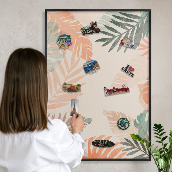Vacation magnet board with a black frame Tropical leaves