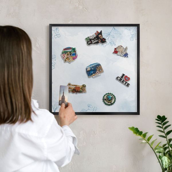 Metal wall board for magnets in a black frame Floristic elegance