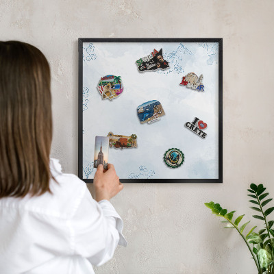 Metal wall board for magnets in a black frame Floristic elegance