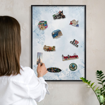Metal wall board for magnets in a black frame Floristic elegance