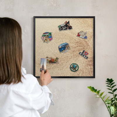 Metal wall board for magnets in a black frame Sand leaves