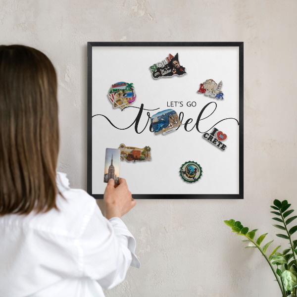 Vacation magnet board with a black frame Let's travel together