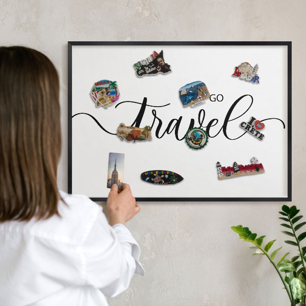 Vacation magnet board with a black frame Let's travel together