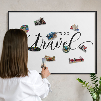 Vacation magnet board with a black frame Let's travel together