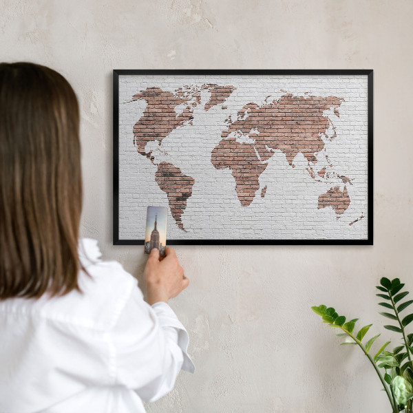 Vacation magnet board with a black frame Brick map