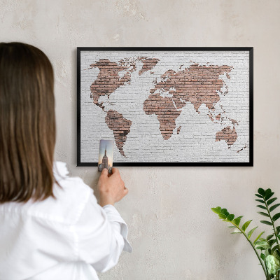 Vacation magnet board with a black frame Brick map