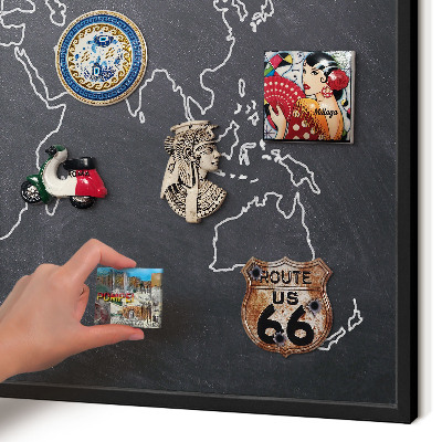 Metal wall board for magnets in a black frame Cretaceous world