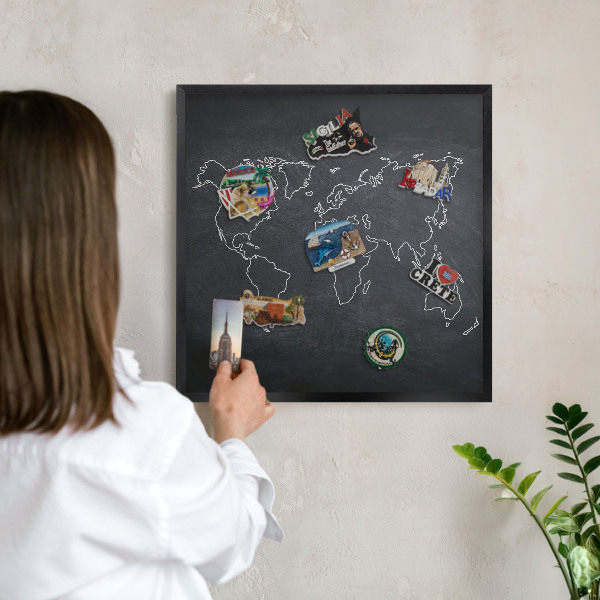Metal wall board for magnets in a black frame Cretaceous world