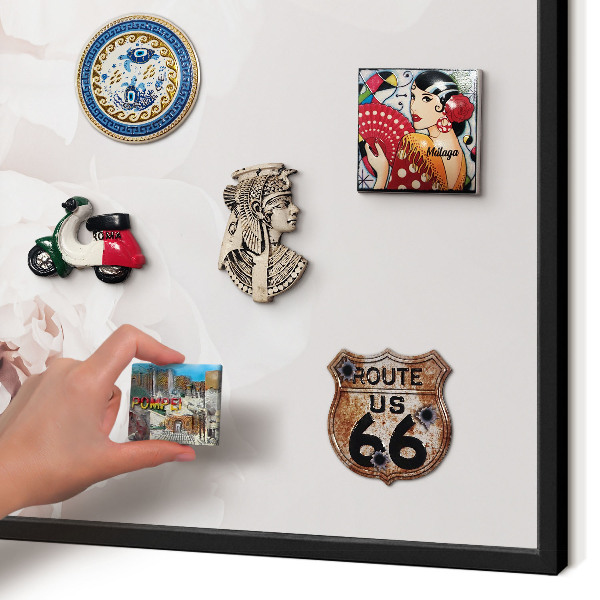 Vacation magnet board with a black frame White peonies