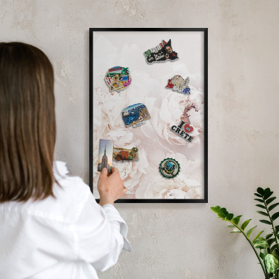 Vacation magnet board with a black frame White peonies