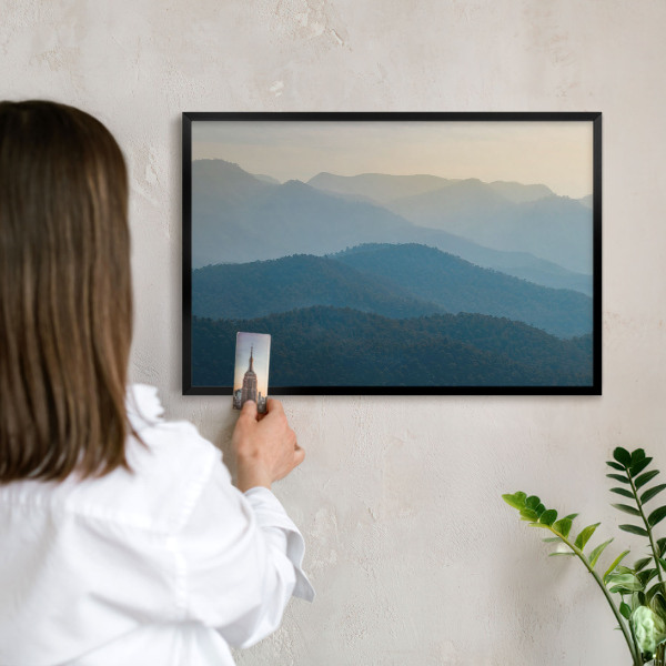 Metal wall board for magnets in a black frame Mountain views