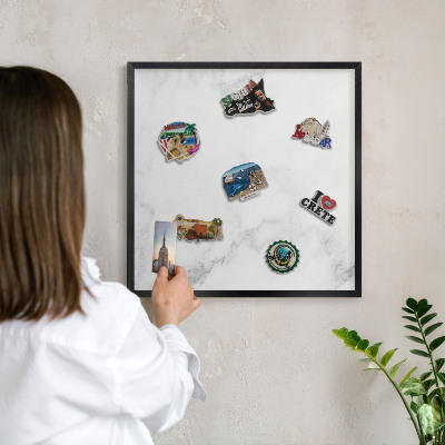 Vacation magnet board with a black frame Elegant marble