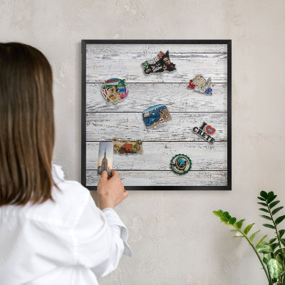 Metal wall board for magnets in a black frame Rustic wood