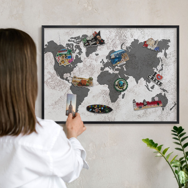 Metal wall board for magnets in a black frame World map