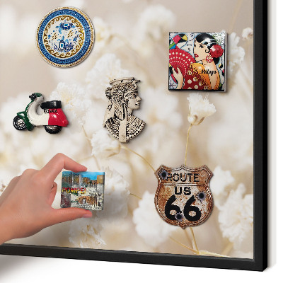 Vacation magnet board with a black frame Beige flowers