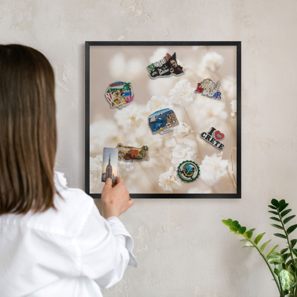 Vacation magnet board with a black frame Beige flowers