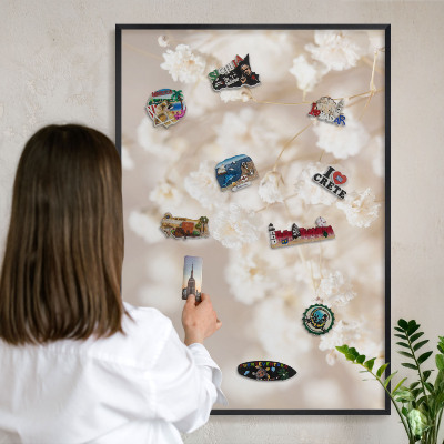 Vacation magnet board with a black frame Beige flowers