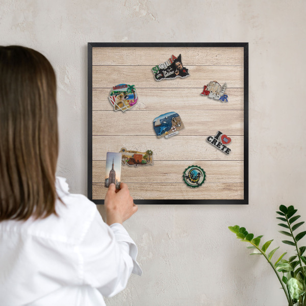 Vacation magnet board with a black frame Wooden boards