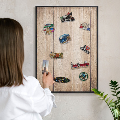 Vacation magnet board with a black frame Wooden boards