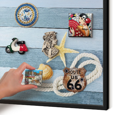 Vacation magnet board with a black frame Maritime climate
