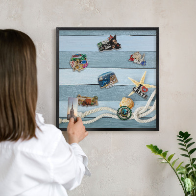 Vacation magnet board with a black frame Maritime climate