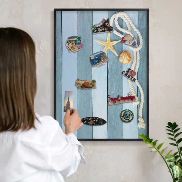 Vacation magnet board with a black frame Maritime climate