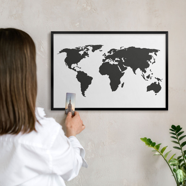 Metal wall board for magnets in a black frame World map