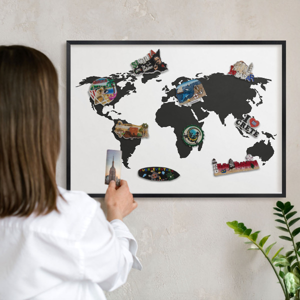 Metal wall board for magnets in a black frame World map