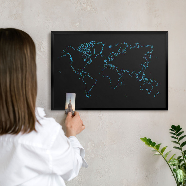 Vacation magnet board with a black frame World map