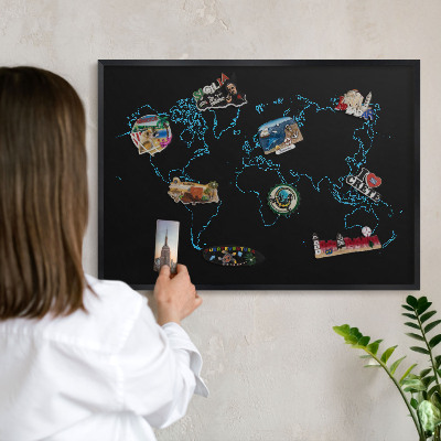 Vacation magnet board with a black frame World map