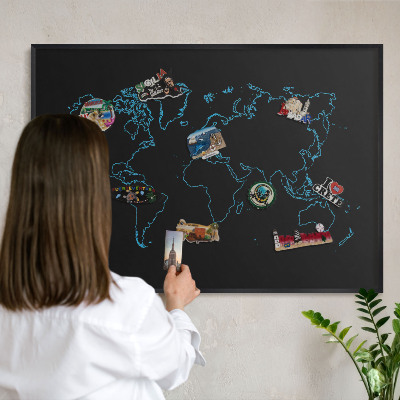 Vacation magnet board with a black frame World map