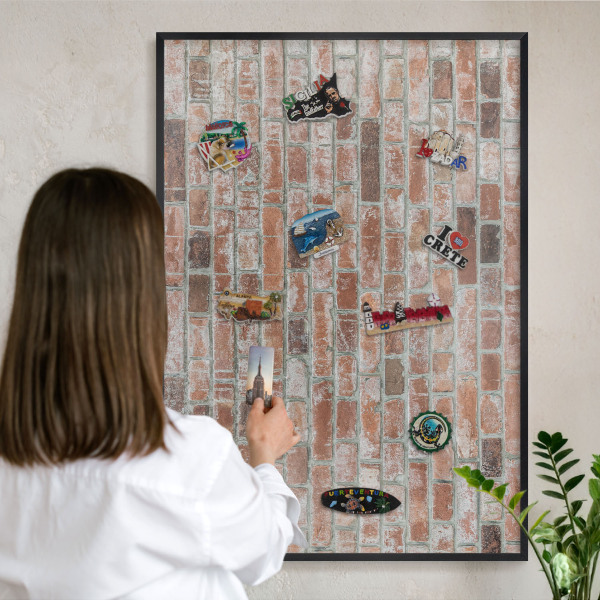 Vacation magnet board with a black frame Brick wall