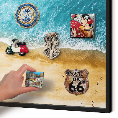 Metal wall board for magnets in a black frame Sea and beach