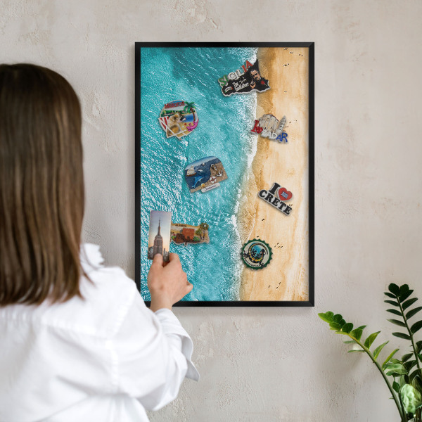 Metal wall board for magnets in a black frame Sea and beach