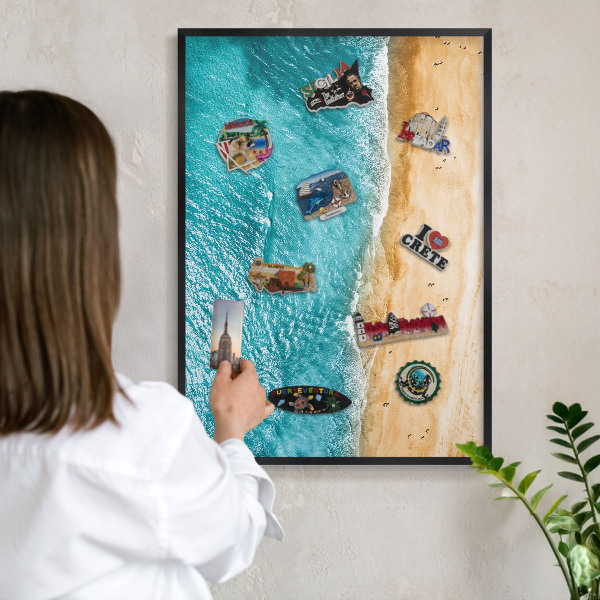 Metal wall board for magnets in a black frame Sea and beach