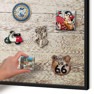 Metal wall board for magnets in a black frame Wooden texture