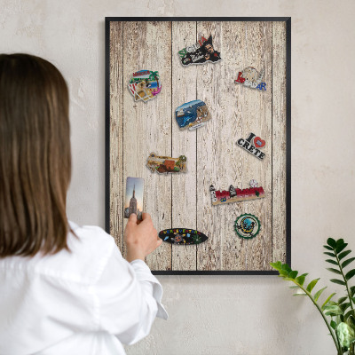 Metal wall board for magnets in a black frame Wooden texture