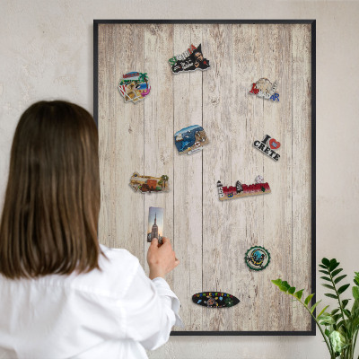 Metal wall board for magnets in a black frame Wooden texture