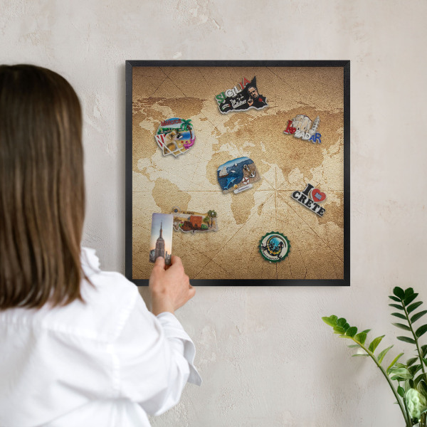 Metal wall board for magnets in a black frame Old map