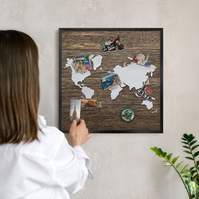 Metal wall board for magnets in a black frame Wooden map
