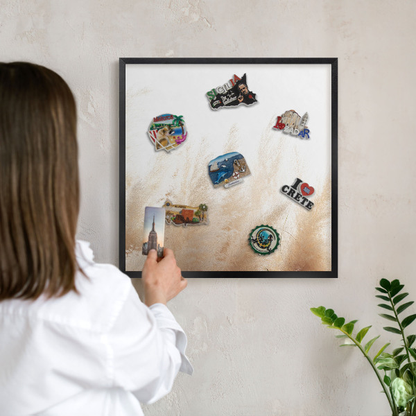 Vacation magnet board with a black frame Essential grasses