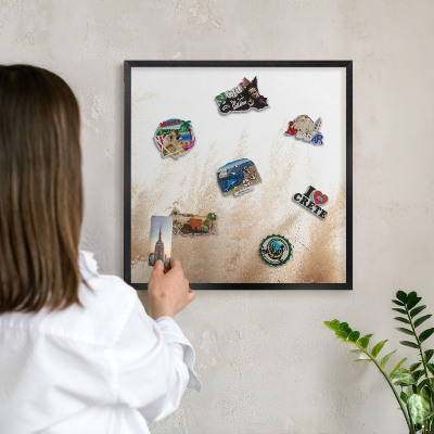 Vacation magnet board with a black frame Essential grasses