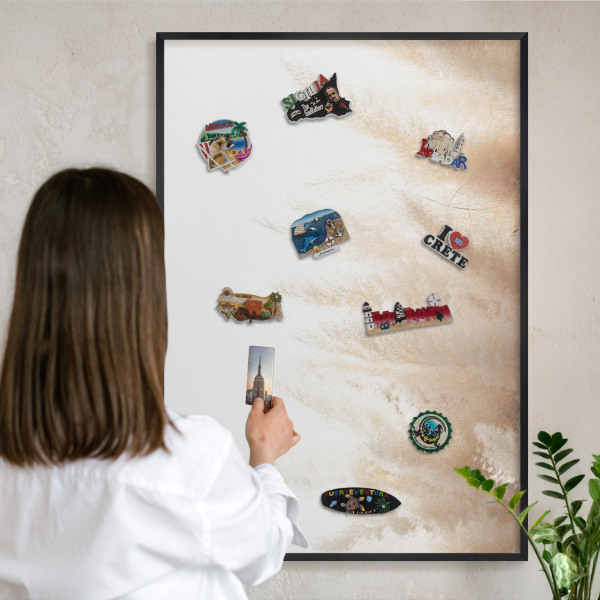 Vacation magnet board with a black frame Essential grasses